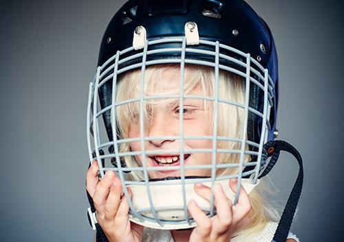 Boy with hockey helmet